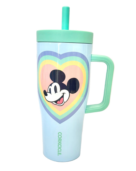 Tumbler with Mickey Mouse design on a light blue background